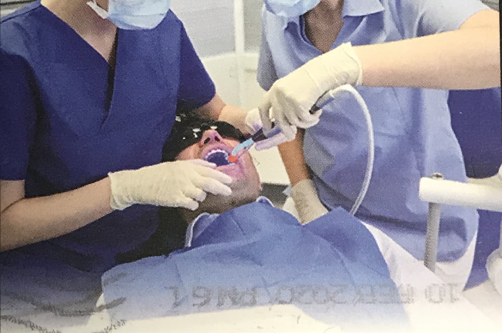 Dental team treating a patient